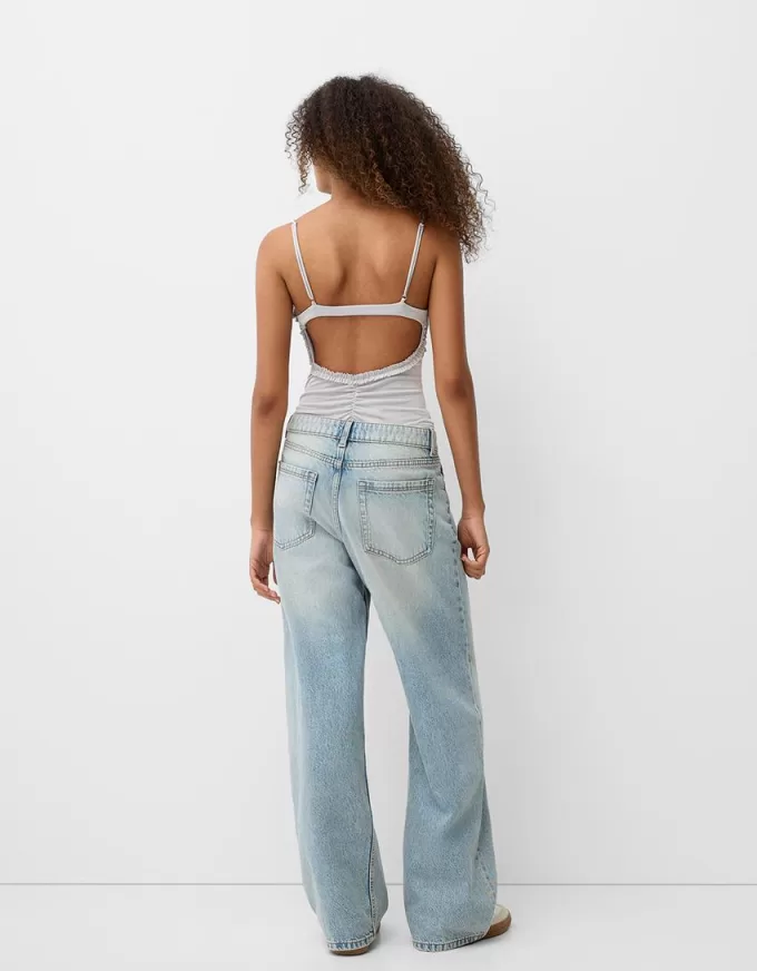 Ruffled bodysuit with straps Ruffled bodysuit with straps