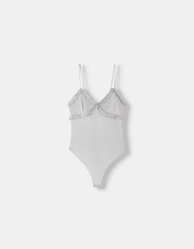 Ruffled bodysuit with straps Ruffled bodysuit with straps