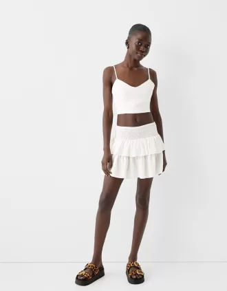 Ruffled mini skirt with elastic waist