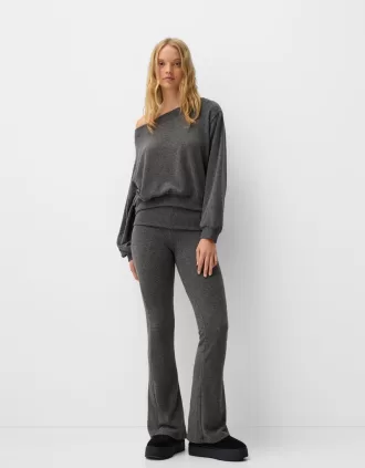 Soft touch flared pants with fold-over waist