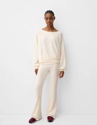 Soft touch flared pants with fold-over waist