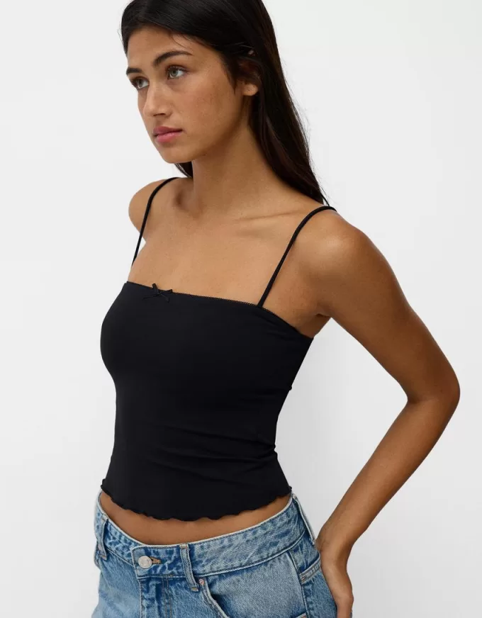 Strappy top with a bow detail