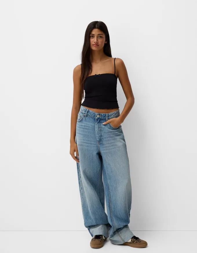 Strappy top with a bow detail