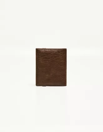 Wallet with elastic closure
