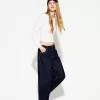 Wide-leg ’90s jeans with turn-up hems Wide-leg ’90s jeans with turn-up hems