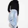 Wide-leg ’90s jeans with turn-up hems Wide-leg ’90s jeans with turn-up hems