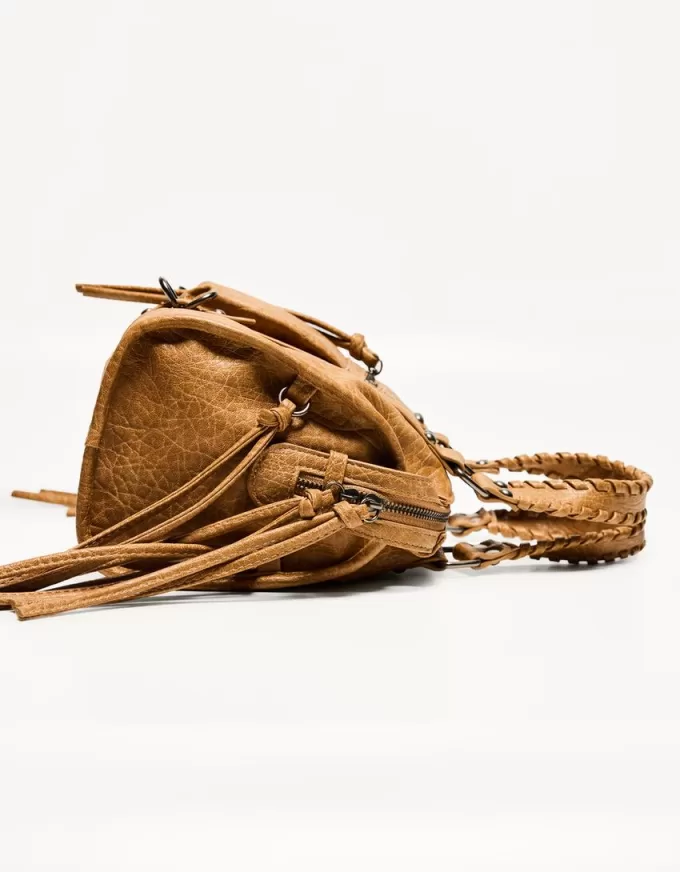 Worn-effect bowling bag with straps