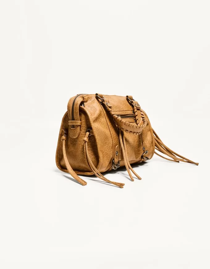 Worn-effect bowling bag with straps
