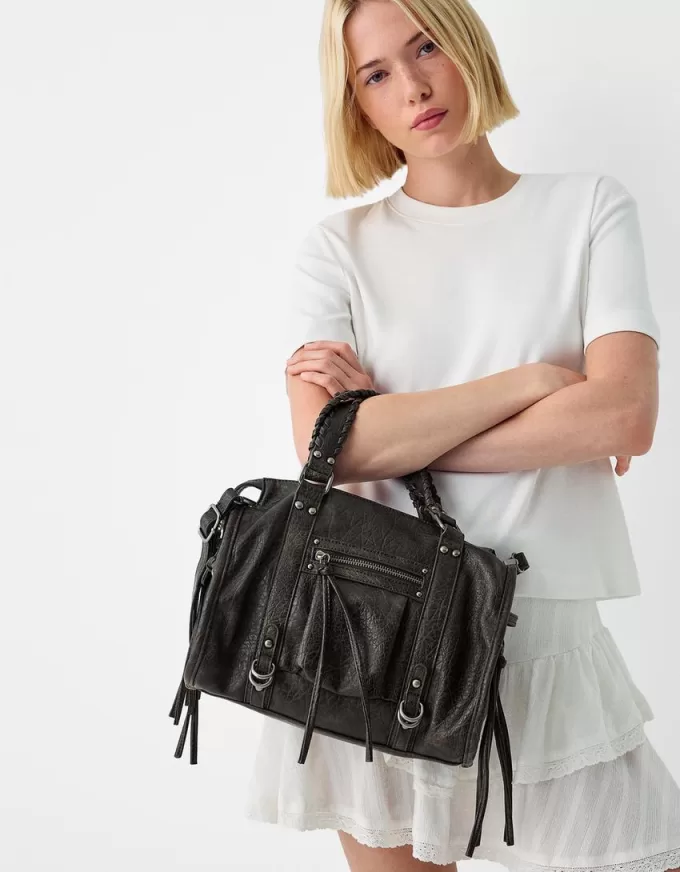 Worn-effect bowling bag with straps